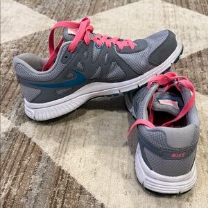 Nike Gray Sneakers with Pink Highlights